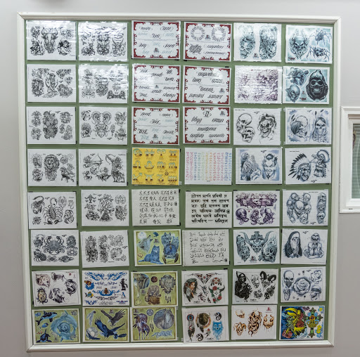 Explore anime couple tattoo ideas, creative tattoo ideas in Greenville, available at Main Street Tattoo On Woodruff