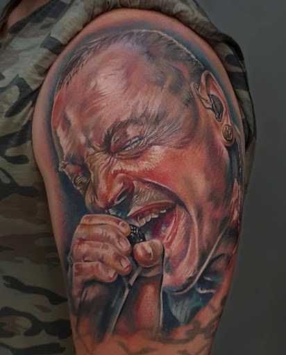 Explore country music tattoo ideas, creative tattoo ideas in Ambler, available at Tattoo GalaxyAmbler Piercing & Custom Tattoos