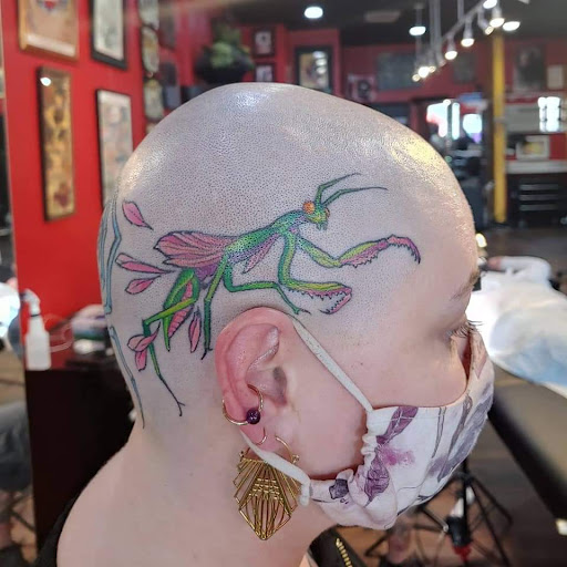 Explore feminine hand tattoo ideas, creative tattoo ideas in Seattle, available at Slave to the Needle Tattoo & Body Piercing