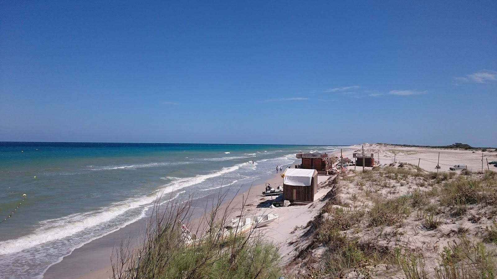 Photo of Hammam El Ghezaz with turquoise pure water surface