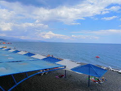 Foto di Profug beach sorretto da scogliere