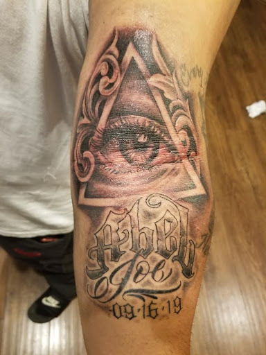 Explore dainty flower tattoo ideas, creative tattoo ideas in Waxahachie, available at ExclusivE Tattoo and Barber