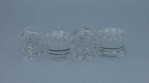 Explore back tattoos for women ideas, creative tattoo ideas in Des Moines, available at Axiom Body Piercing Studio