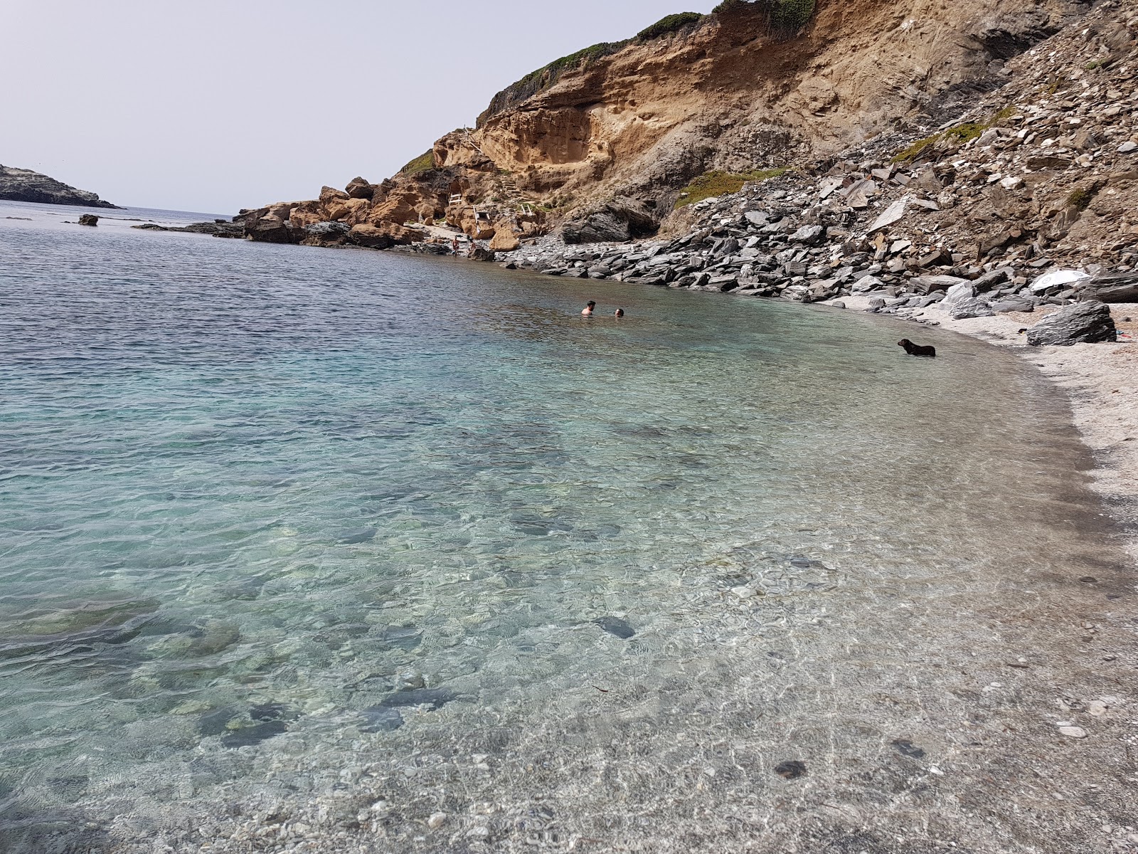 Foto van Spiaggia della Nurra met kleine baai