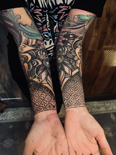 Explore back shoulder tattoo ideas for men, creative tattoo ideas in Hudson, available at The Bohemian Social Club