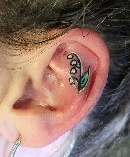 Explore chest tattoo lettering ideas, creative tattoo ideas in Forney, available at Royal Circle Tattoo studio