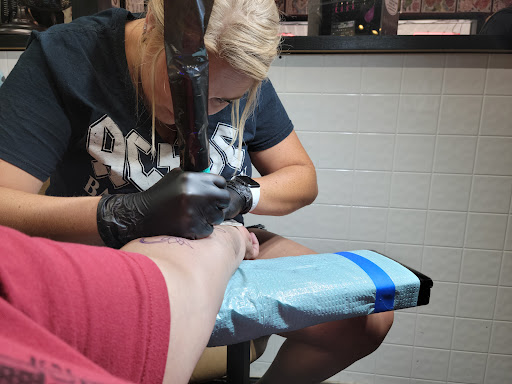 Explore lips tattoo ideas, creative tattoo ideas in Waverly, available at Hellbilly Tattoos & Oddities