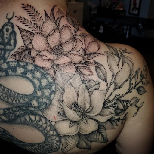 Explore moon tattoo ideas, creative tattoo ideas in Palm Harbor, available at Angry Owl Tattoo and Piercing