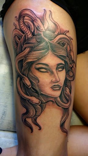 Explore charizard tattoo ideas, creative tattoo ideas in Waipahu, available at Inkflicted Tattoo