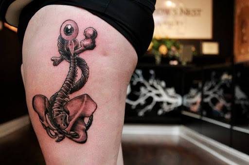 Explore ariana grande tattoo ideas, creative tattoo ideas in Dubuque, available at The Crows Nest
