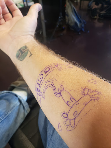 Explore dark hand tattoo ideas, creative tattoo ideas in Tucson, available at Sublime Tattoo