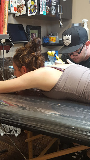 Explore christmas tree tattoo ideas, creative tattoo ideas in Roseville, available at Dv8 Tattoo and Body Piercing