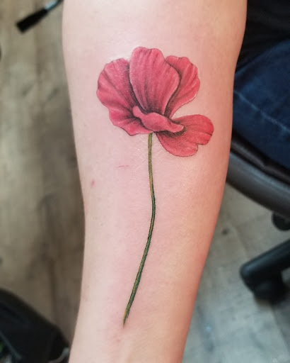 Explore small men tattoo ideas, creative tattoo ideas in Fort Myers, available at Tiger Lotus Tattoo and Piercing