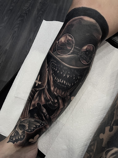 Explore purple flower tattoo ideas, creative tattoo ideas in Glendale, available at PRINCE ART AND INK