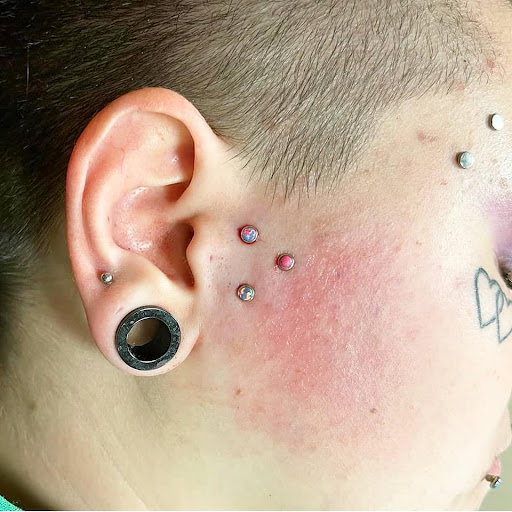 Explore stomach tattoo ideas, creative tattoo ideas in Charleston, available at Exotic Impressions Body Piercing