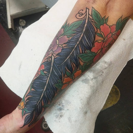 Explore ouroboros tattoo ideas, creative tattoo ideas in Vista, available at American Tattoo Vista