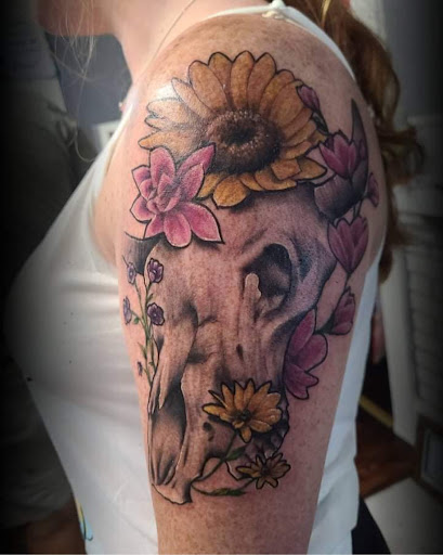 Explore betrayed tattoo ideas, creative tattoo ideas in Valdosta, available at Acid Ink Tattoos