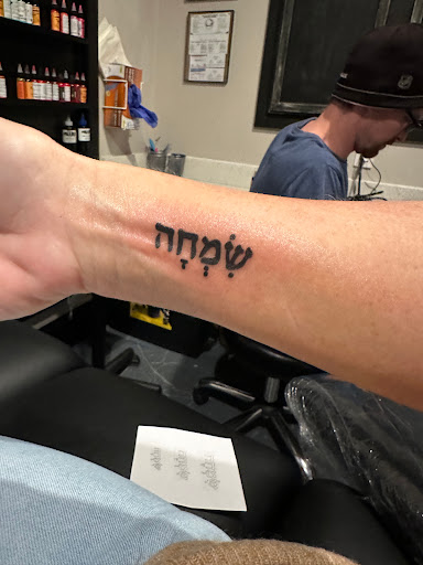 Explore morticia and gomez tattoo ideas, creative tattoo ideas in Myrtle Beach, available at Elite Ink Tattoos of Myrtle Beach