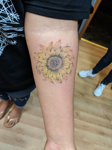 Find wrist bracelet tattoo ideas for your next unique tattoo in Kenosha at Kenosha Tattoo Company
