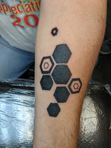 Explore bee tattoo ideas for guys, creative tattoo ideas in Brunswick, available at Body Revolution Tattoos & Body Piercings