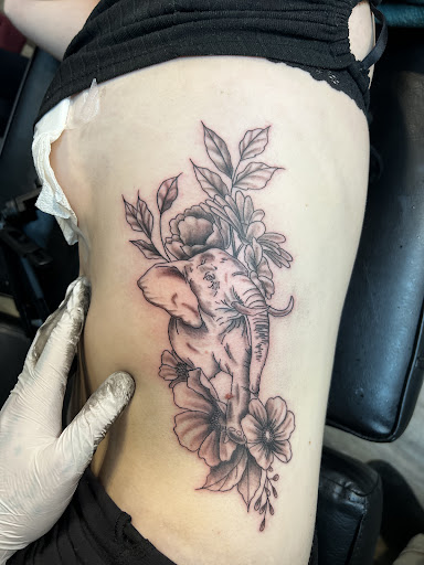 Explore santa tattoo ideas, creative tattoo ideas in Spokane, available at Mystery Ink Tattoo