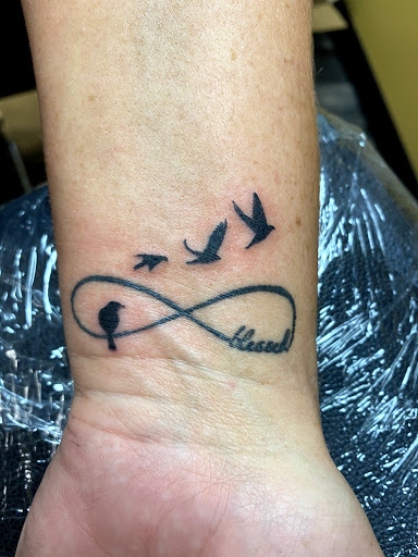 Explore nipsey hussle tattoos ideas, creative tattoo ideas in Warner Robins, available at Untold Pain Tattoo Studio