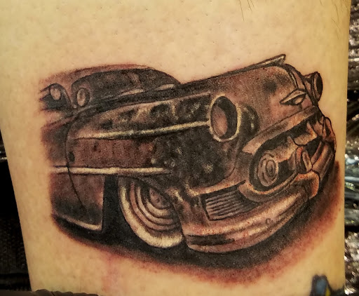 Tattoo Shop «Flesh To Fantasy Tattoo Emporium», reviews and photos, 721 S Main St, Bellefontaine, OH 43311, USA