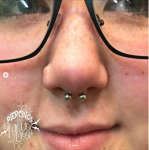 Explore slytherin tattoo ideas, creative tattoo ideas in Oshkosh, available at Piercings by Molly Moon at 920 Tattoo and Piercing