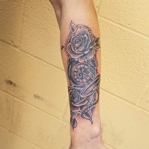 Explore mens arm tattoo ideas small, creative tattoo ideas in Hilliard, available at 22 Caliber Tattoo Mega Studio