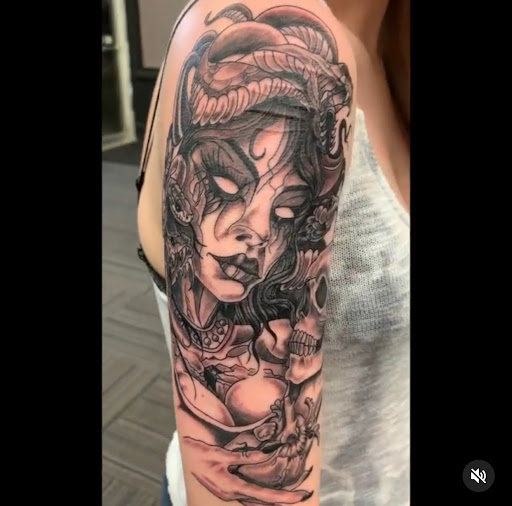 Explore dark tattoo ideas for women, creative tattoo ideas in Hastings, available at Distinctive INK Tattoo LLC