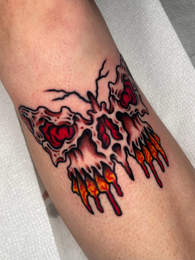 Explore yellow rose tattoo ideas, creative tattoo ideas in Johnson City, available at Gold Cross Tattoo Co.