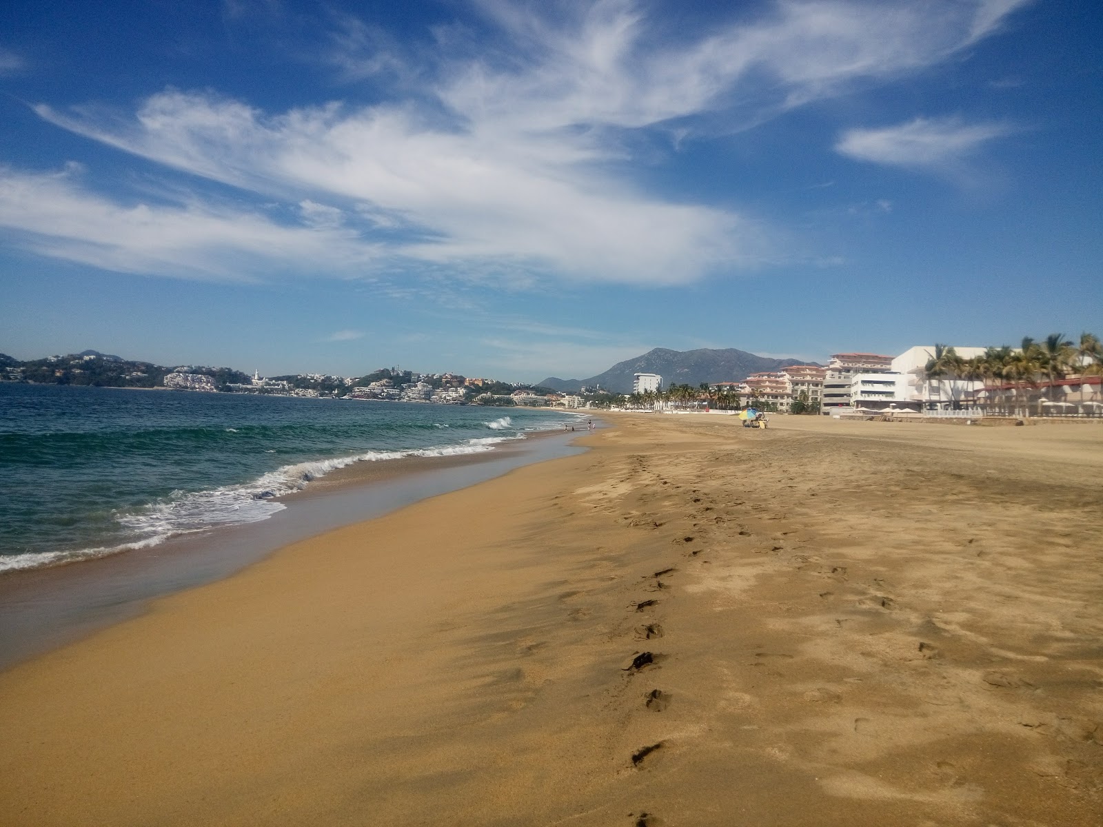 Foto van Playa Olas Altas met fijn bruin zand oppervlakte