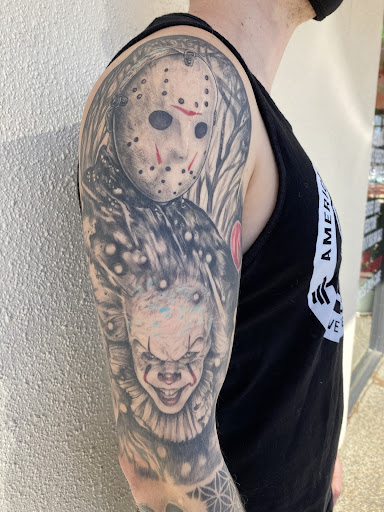 Explore colorful sleeve tattoo ideas, creative tattoo ideas in Santa Clara, available at Vampire Battle Mansion Tattoo and Piercing