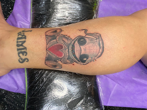 Explore cash tattoo ideas, creative tattoo ideas in Fort Myers, available at Loyal 2 The Coil Tattoos & Piercings (Edison Mall Location Entrance F)