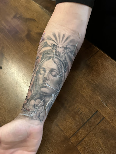 Explore mens arm tattoo ideas small, creative tattoo ideas in Fountain, available at United Tattoo