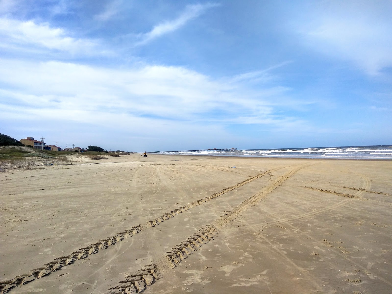 Foto de Praia Costa do Sol com água turquesa superfície