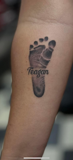 Explore negative space tattoo ideas, creative tattoo ideas in Demotte, available at Revelations Tattoo Parlor