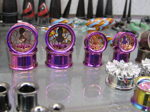 Explore pretty flower tattoo ideas, creative tattoo ideas in Sarasota, available at Z-Edge Tattoo and Body Piercing North Shop