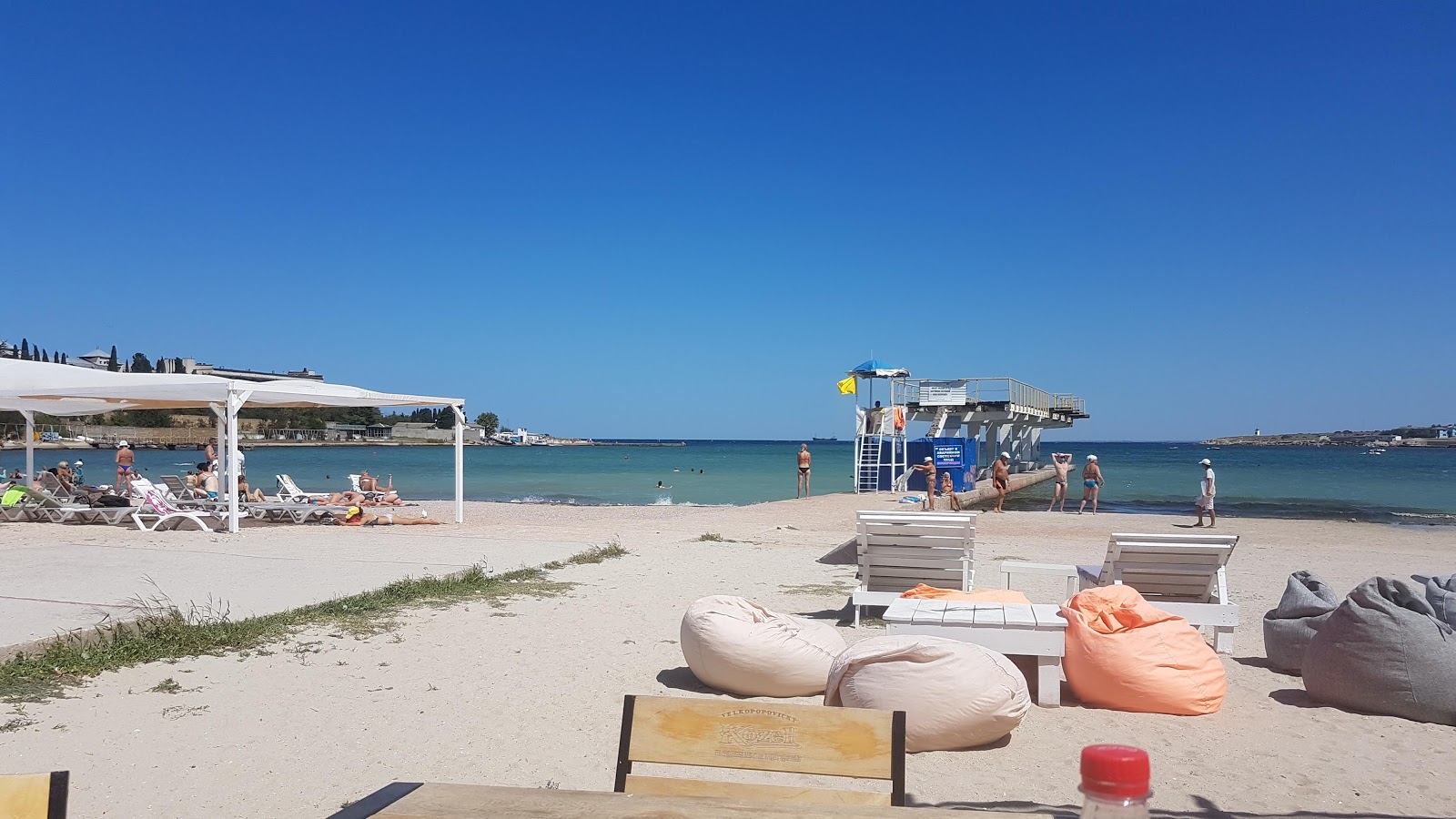 Omega beach'in fotoğrafı - Çocuklu aile gezginleri için önerilir
