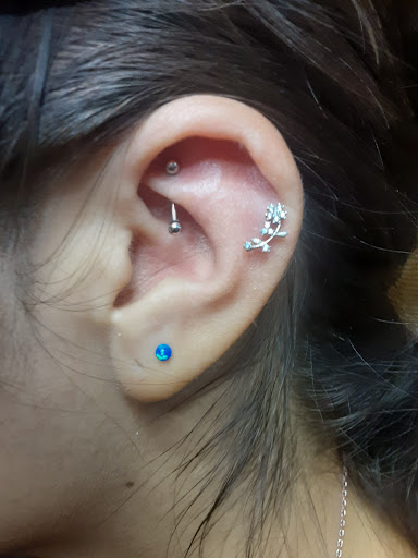 Find small sunflower tattoo ideas for your next unique tattoo in El Paso at Whiskeys piercings