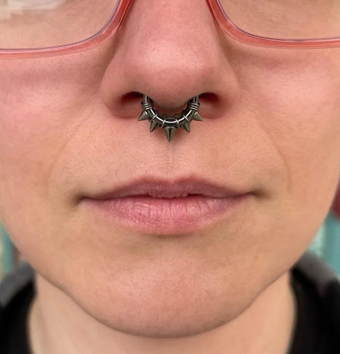 Explore tombstone movie tattoo ideas, creative tattoo ideas in Aurora, available at Bespoke Piercing & Jewelry (Inside Bonaroo Tattoo)