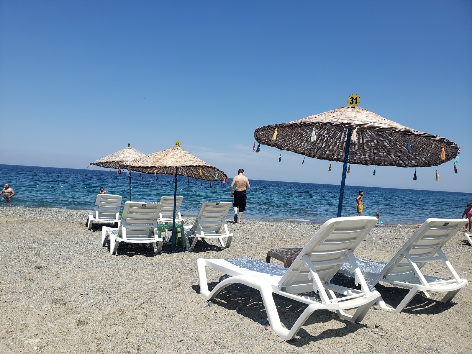 Foto de Taka beach e o assentamento