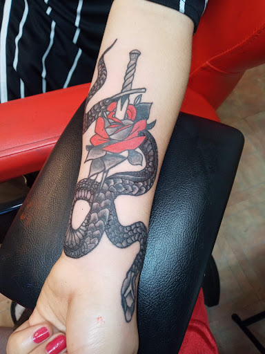 Explore elvis presley tattoo ideas, creative tattoo ideas in Monticello, available at Saints Tattoos