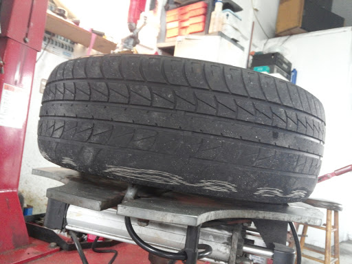 Tire Shop «Mikes Aok Tire & Auto Repair», reviews and photos, 135 Tomahawk Dr, Satellite Beach, FL 32937, USA