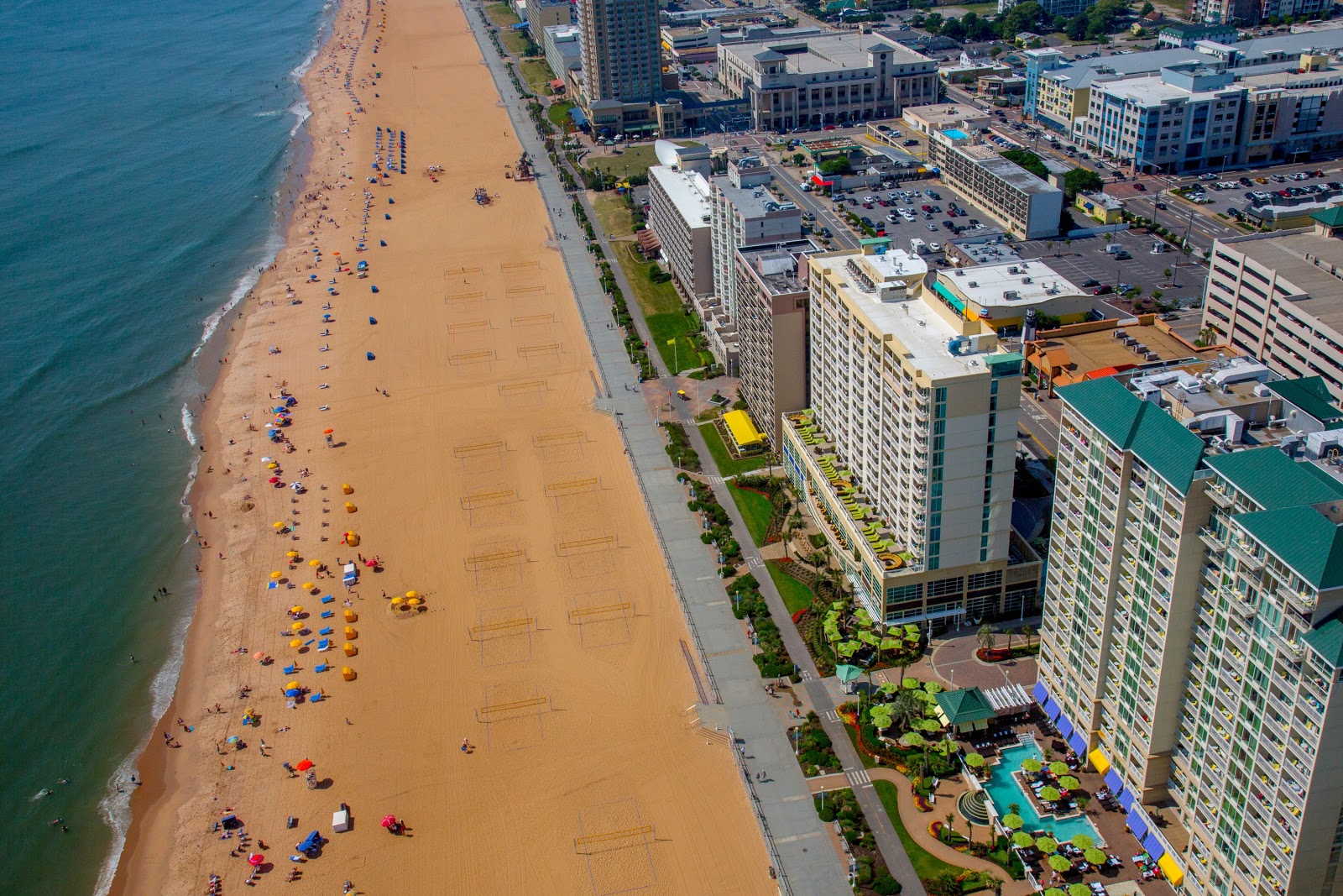 Photo of Virginia beach with turquoise pure water surface