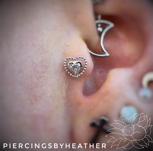 Explore marriage ring tattoo ideas, creative tattoo ideas in New Orleans, available at Downtown Tattoos and Piercing