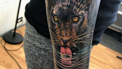 Explore swirl tattoo ideas, creative tattoo ideas in Sarasota, available at SEVEN SINS Tattoo Studio