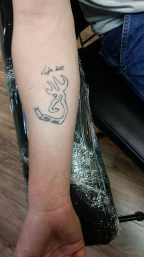 Explore cross tattoos ideas, creative tattoo ideas in Barre, available at Bury The Needle Tattoo