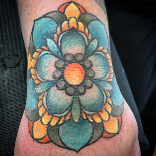 Explore bouquet tattoo ideas, creative tattoo ideas in Tecumseh, available at Lucid Tattoo Gallery