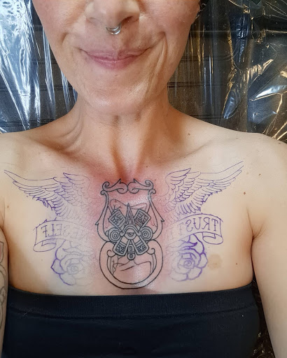 Explore women's hand tattoo ideas, creative tattoo ideas in Clearfield, available at Platypus Tattoo Co.